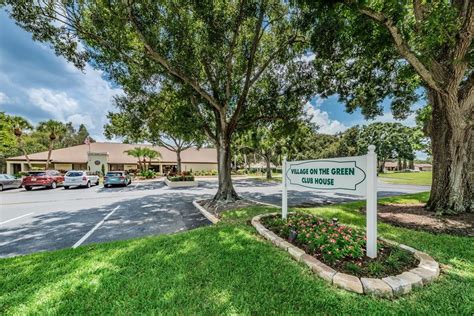 village on the green hoa.